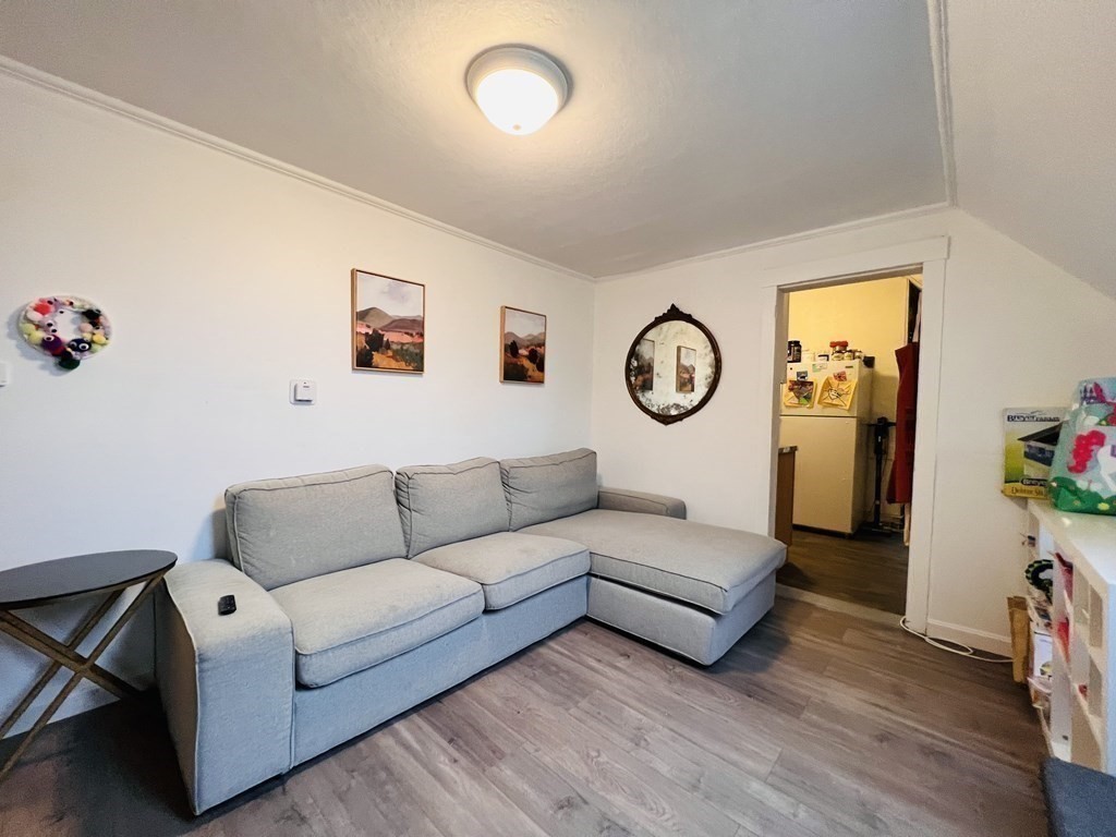 72 Oak Street Middleboro, MA 02346 - Photo 24 of 42 a living room with furniture and a large window