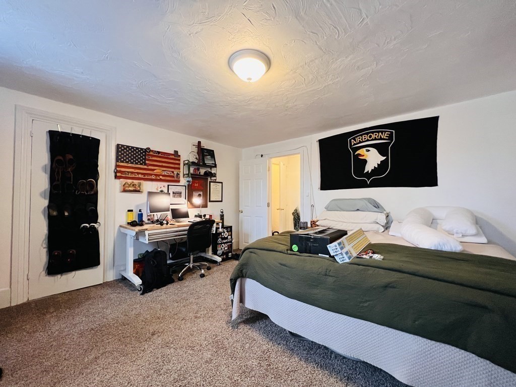 72 Oak Street Middleboro, MA 02346 - Photo 31 of 42 a bedroom with bed couch and window