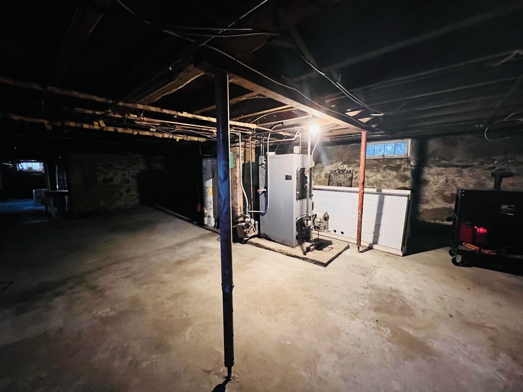 72 Oak Street Middleboro, MA 02346 - Photo 42 of 42 a view of a garage with gym equipment