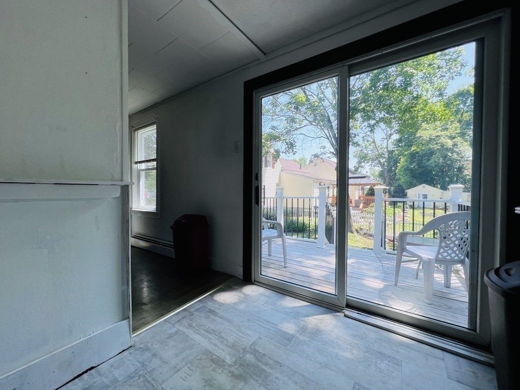 72 Oak Street Middleboro, MA 02346 - Photo 7 of 42 a view of a glass door and an outdoor space