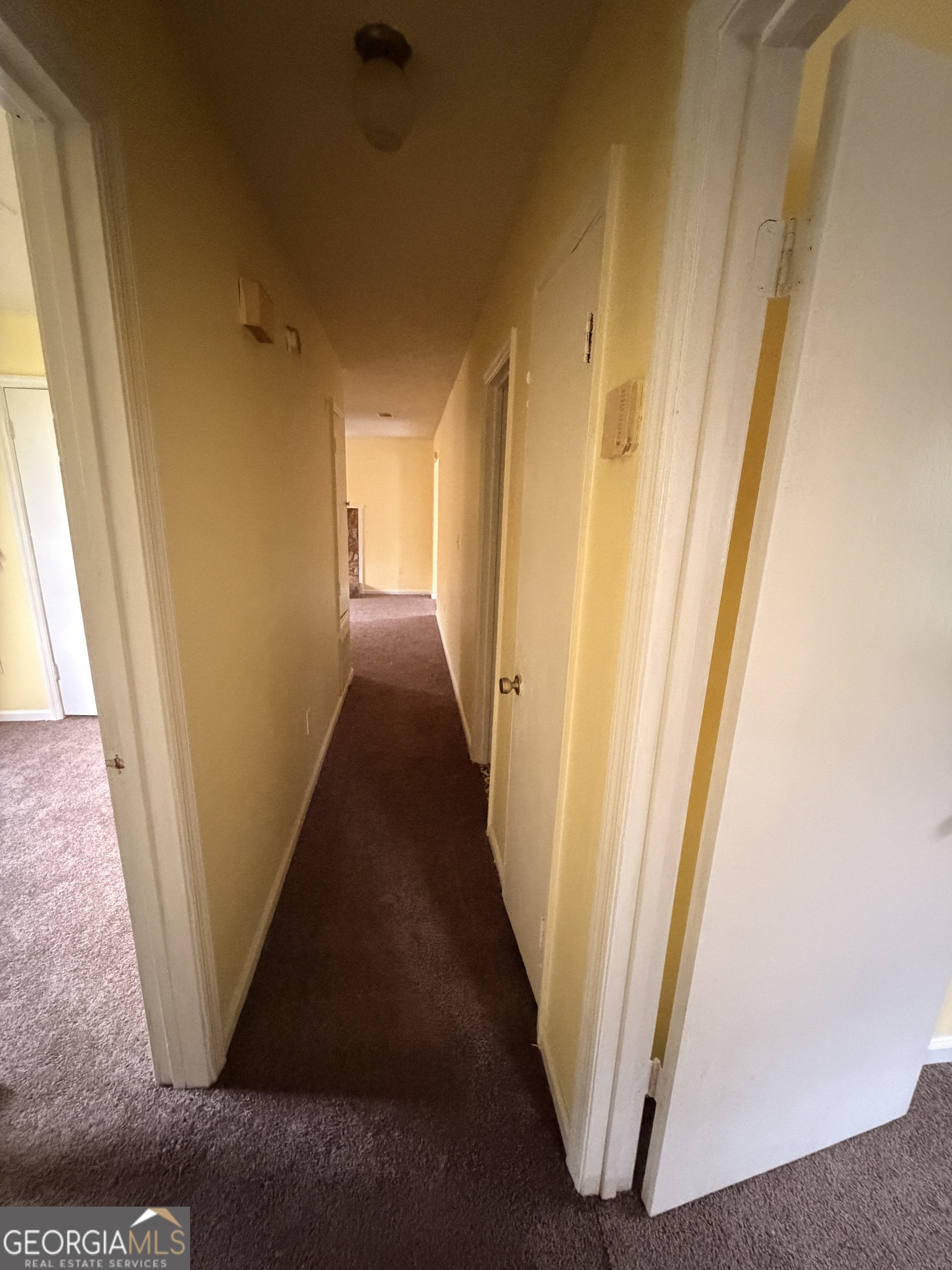 3523 Morgan Road Hephzibah, GA 30815 - Photo 11 of 15 a view of a hallway with a door