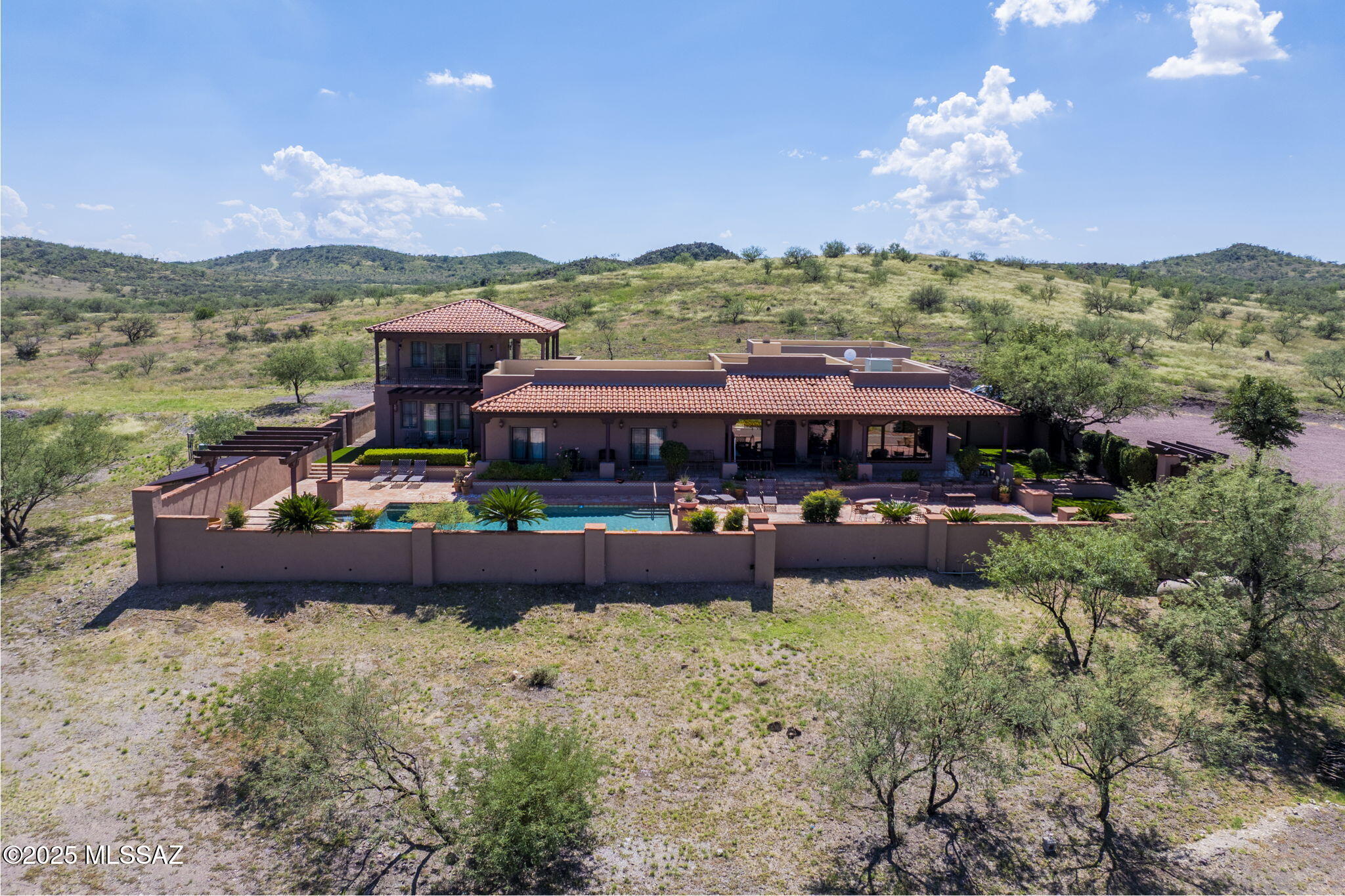 1265 Morning Star Drive Rio Rico, AZ 85648 - Photo 5 of 50 a view of a big yard with potted plants