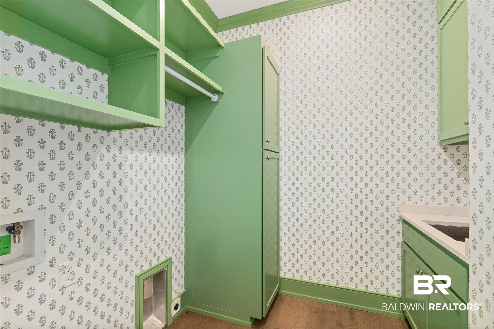 3 Canterbury Park Mobile, AL 36608 - Photo 23 of 43 Clothes washing area with cabinet space, wallpapered walls, hookup for a washing machine, dark wood finished floors, and baseboards