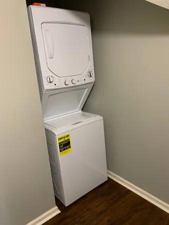 an entryway with wooden floor