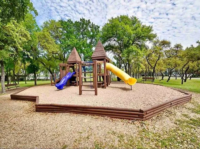 a park view with a bench