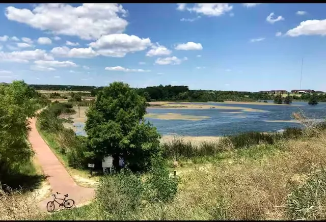 a view of a lake from a yard