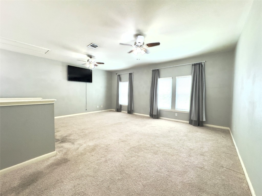 401 Witte Road Kyle, TX 78640 - Photo 9 of 33 a view of an empty room with a window