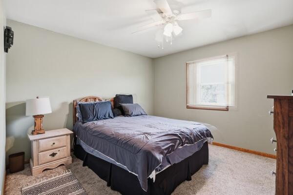 1547 West 99th Avenue Crown Point, IN 46307 - Photo 11 of 21 a bedroom with bed and window