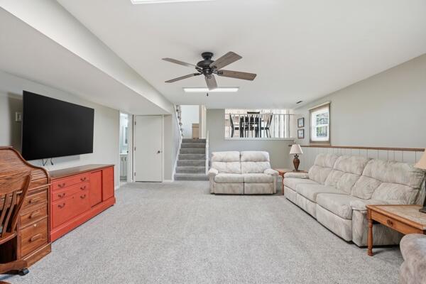 1547 West 99th Avenue Crown Point, IN 46307 - Photo 12 of 21 a living room with furniture and a flat screen tv