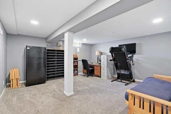 1547 West 99th Avenue Crown Point, IN 46307 - Photo 14 of 21 a view of a room with gym equipment