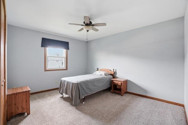 1547 West 99th Avenue Crown Point, IN 46307 - Photo 9 of 21 a bed room with a bed and a window