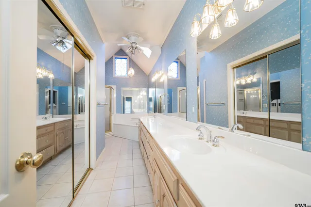 a view of a hallway with closet