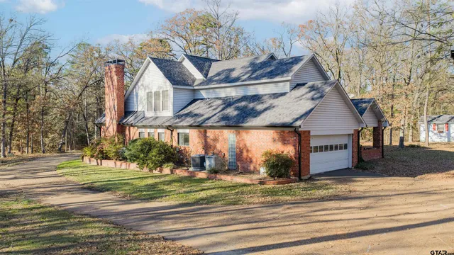 a view of house with outdoor space