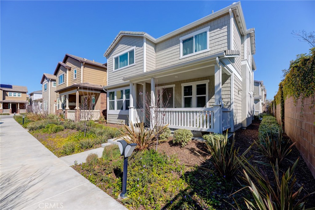 front view of a house with a small yard