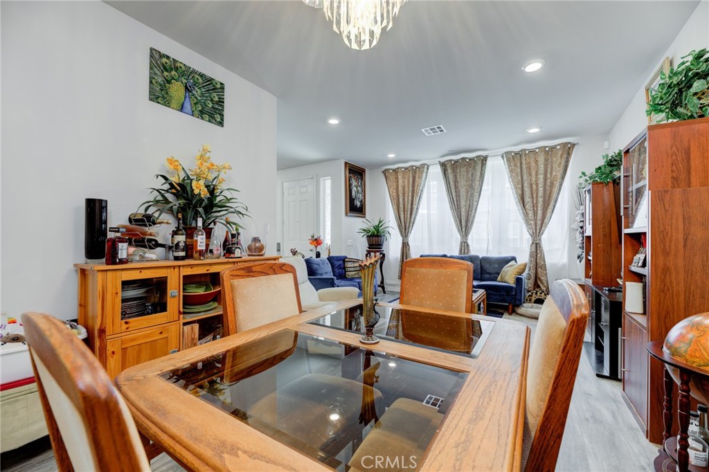 11 Lilac Lane Compton, CA 90221 - Photo 12 of 49 a living room with furniture and a flat screen tv