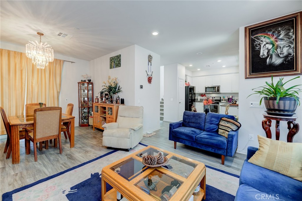 11 Lilac Lane Compton, CA 90221 - Photo 14 of 49 a living room with furniture and a large window