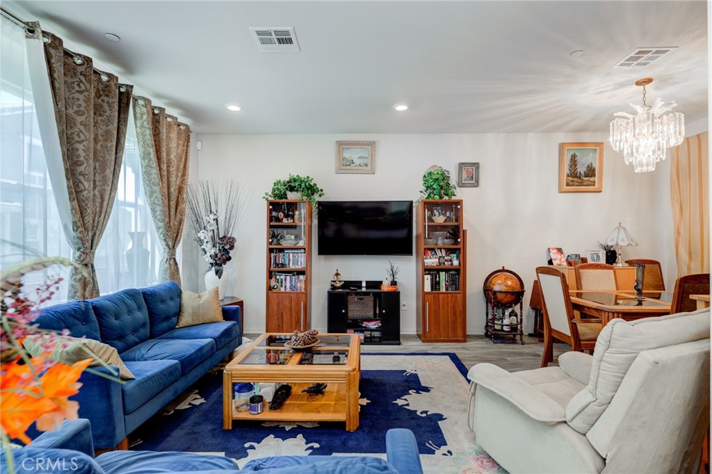 11 Lilac Lane Compton, CA 90221 - Photo 18 of 49 a living room with furniture and a flat screen tv