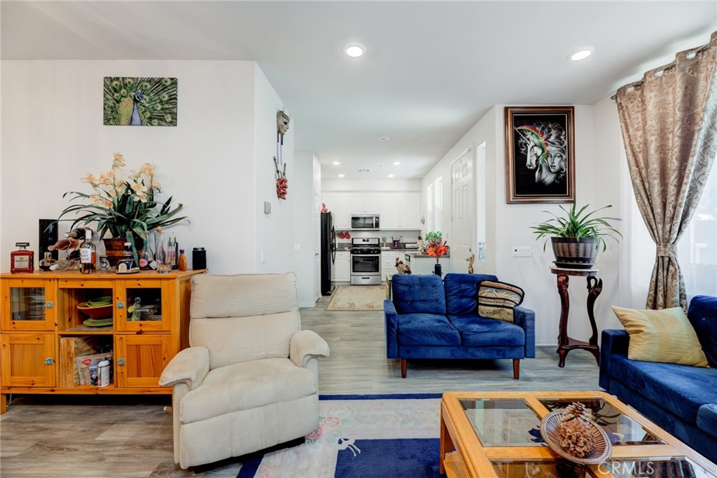 11 Lilac Lane Compton, CA 90221 - Photo 19 of 49 a living room with furniture and a potted plant