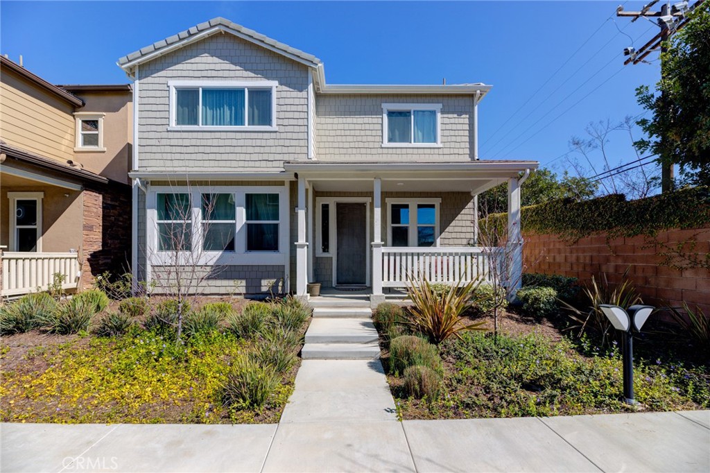 11 Lilac Lane Compton, CA 90221 - Photo 2 of 49 a front view of a house with garden