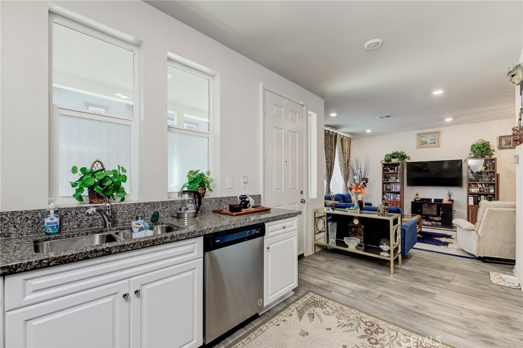 11 Lilac Lane Compton, CA 90221 - Photo 23 of 49 a kitchen with sink and cabinets