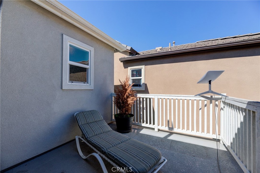 11 Lilac Lane Compton, CA 90221 - Photo 29 of 49 a view of a chair and table in the balcony