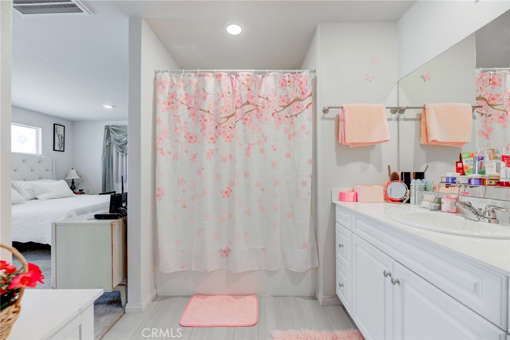 11 Lilac Lane Compton, CA 90221 - Photo 31 of 49 a bathroom with a sink and a mirror