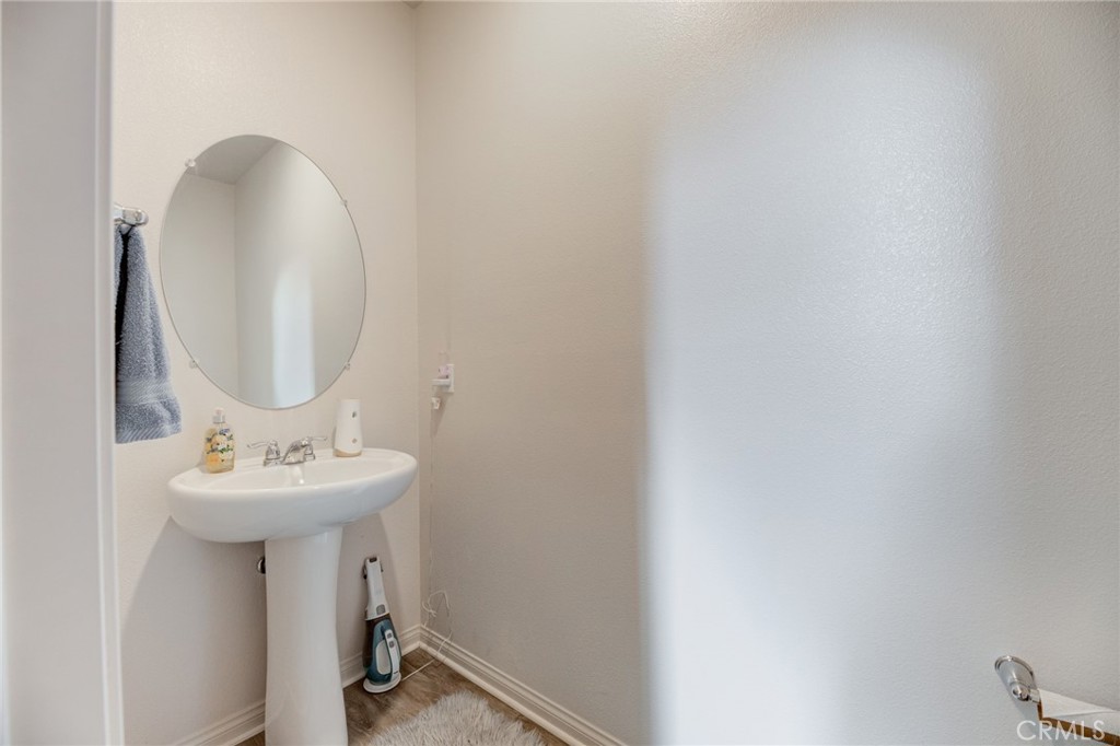 11 Lilac Lane Compton, CA 90221 - Photo 36 of 49 a bathroom with a sink and a mirror