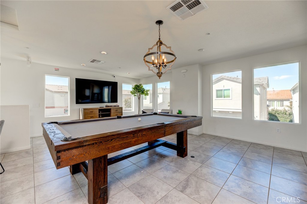 11 Lilac Lane Compton, CA 90221 - Photo 48 of 49 a living room with furniture and a flat screen tv