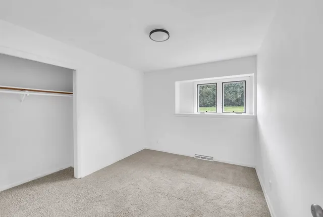 an empty room with a window