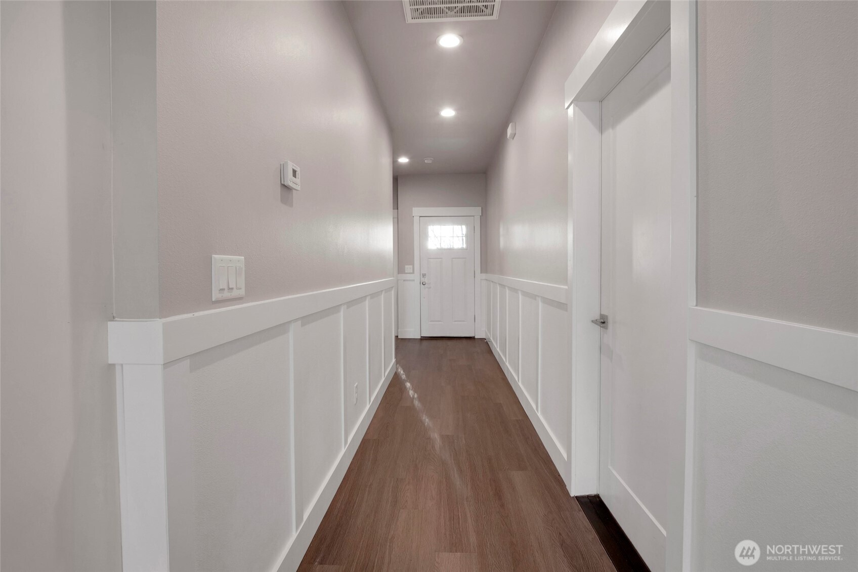 1213 Rd F .2 Northeast, Unit A&B Moses Lake, WA 98837 - Photo 11 of 37 a view of a hallway with wooden floor