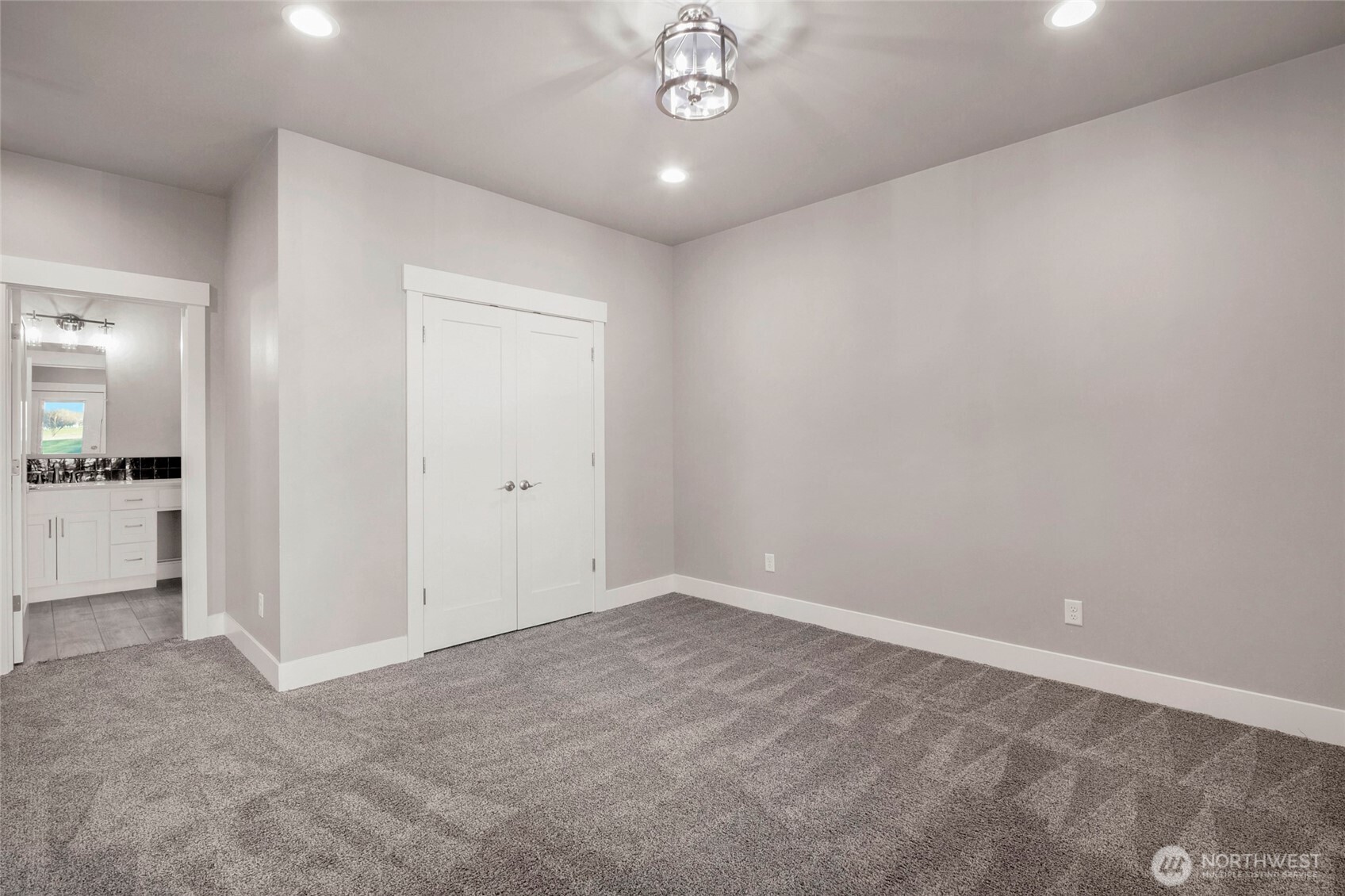 1213 Rd F .2 Northeast, Unit A&B Moses Lake, WA 98837 - Photo 23 of 37 wooden floor in an empty room with a window