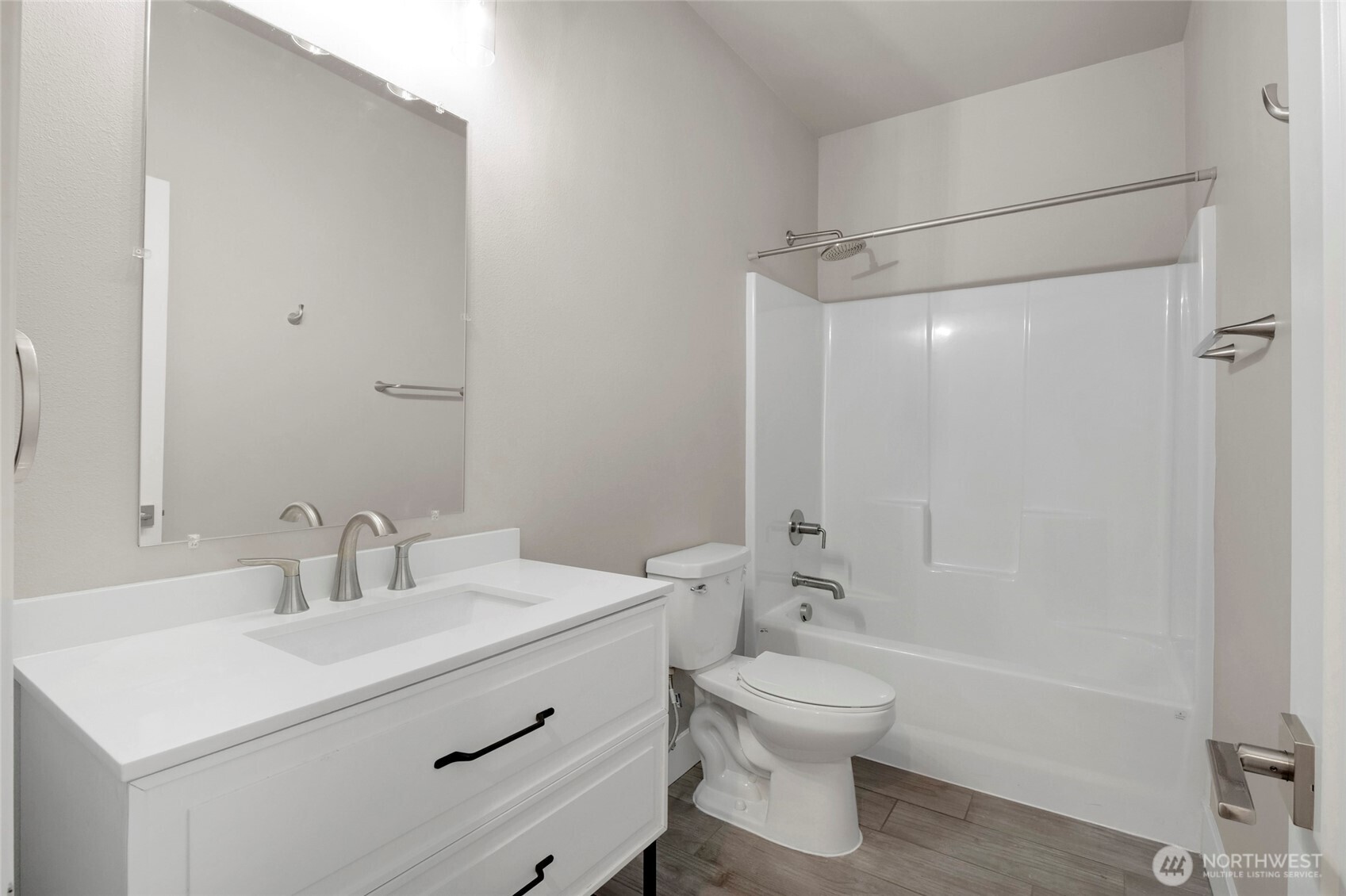 1213 Rd F .2 Northeast, Unit A&B Moses Lake, WA 98837 - Photo 29 of 37 a bathroom with a sink a toilet and shower