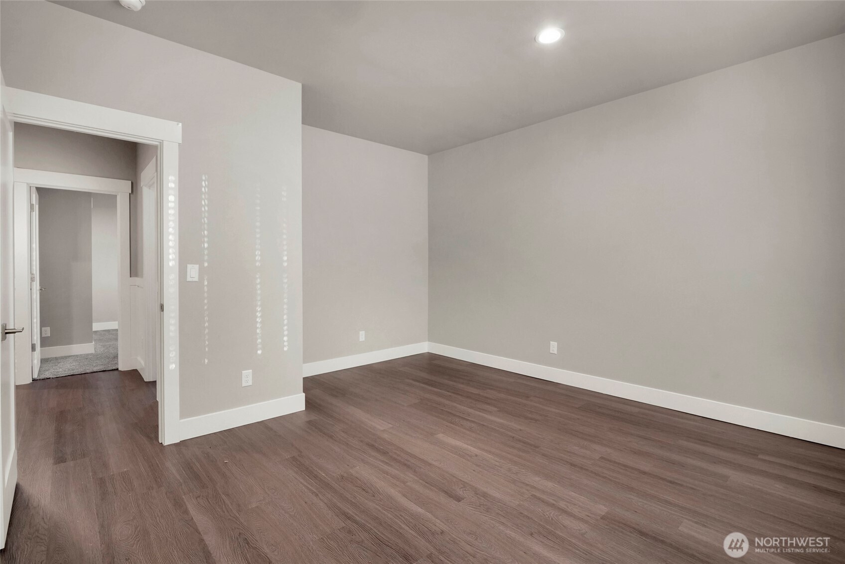 1213 Rd F .2 Northeast, Unit A&B Moses Lake, WA 98837 - Photo 31 of 37 a view of an empty room with wooden floor
