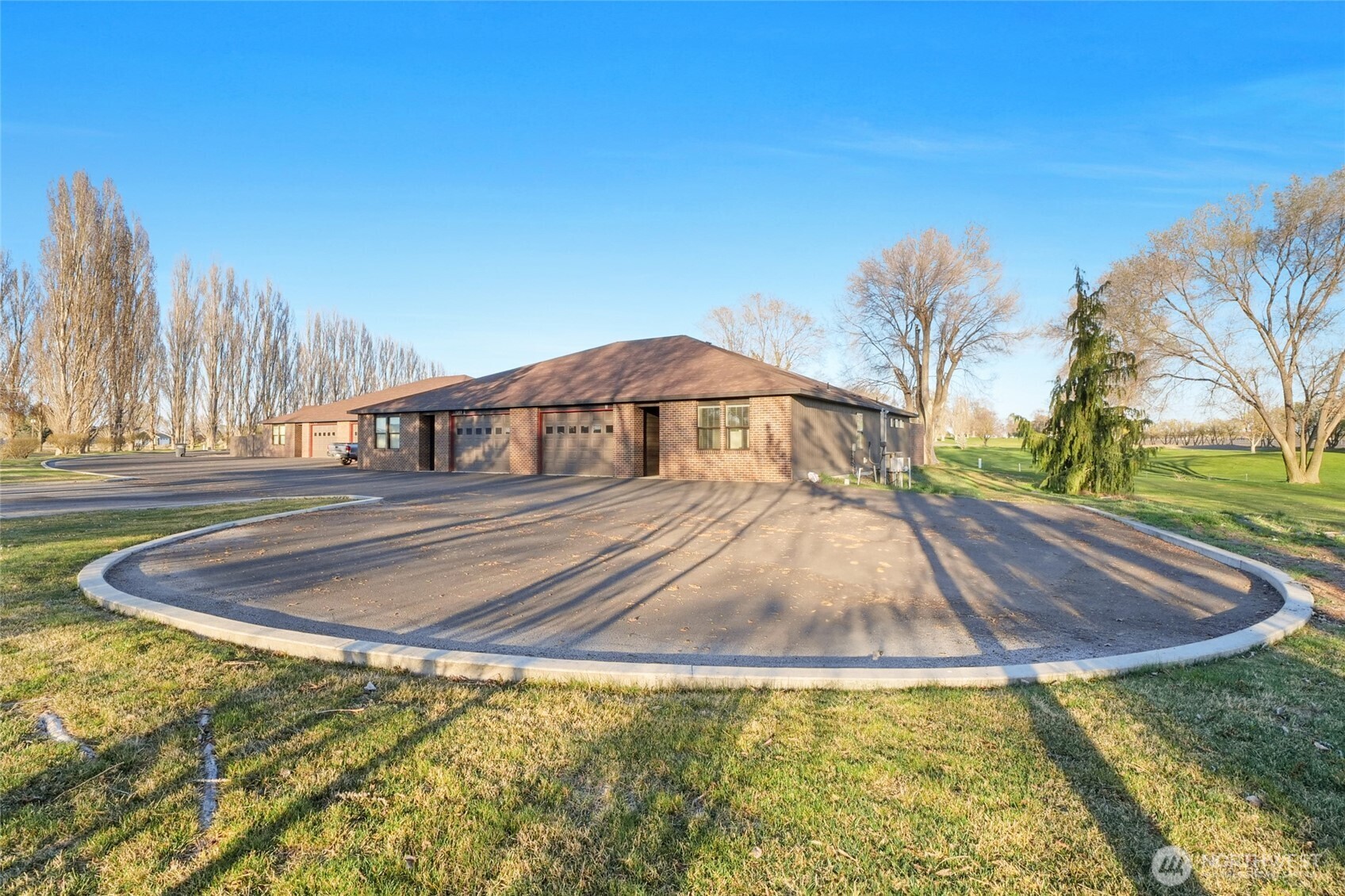 1213 Rd F .2 Northeast, Unit A&B Moses Lake, WA 98837 - Photo 6 of 37 a swimming pool with outdoor seating and yard