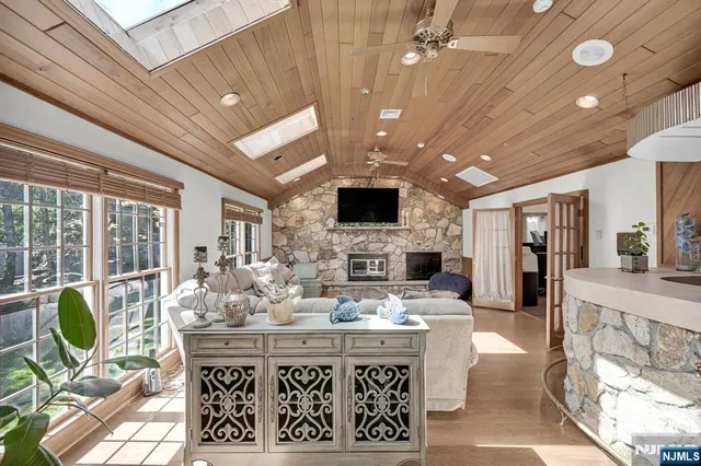 a view of a kitchen with dining table and chairs
