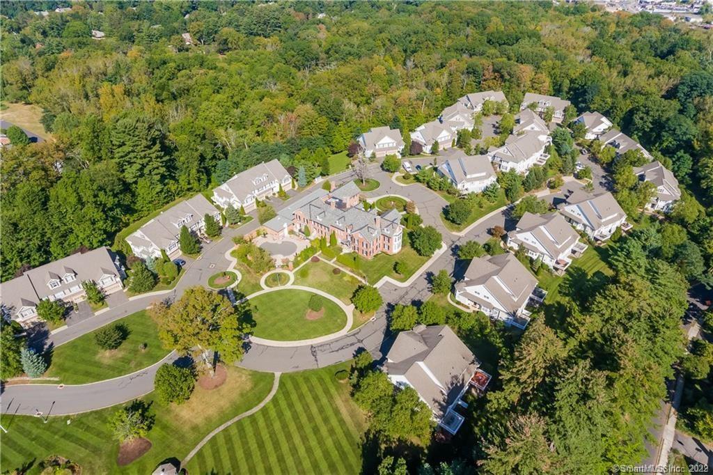71 Goodwin Circle, Unit 71 Hartford, CT 06105 - Photo 1 of 1 an aerial view of a house with a yard