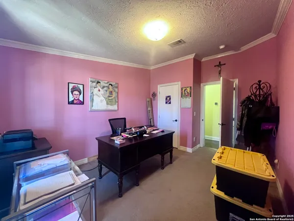 a room with furniture and musical instruments