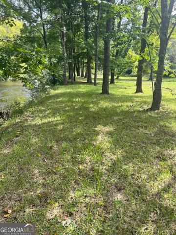 a view of an outdoor space with a lake view