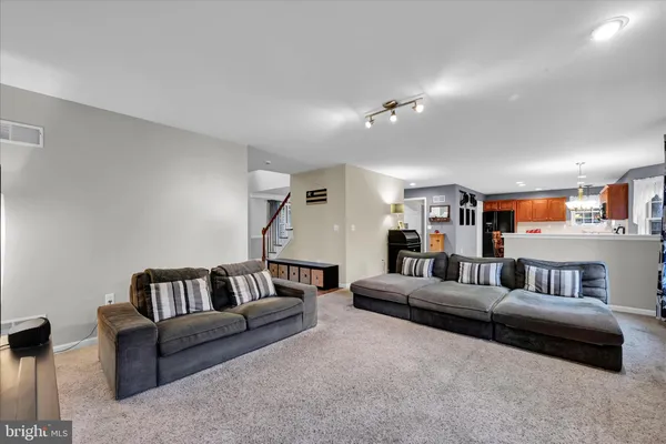a living room with furniture and a couch