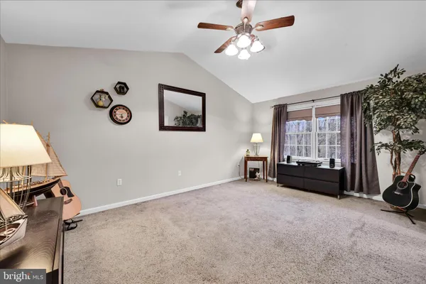 a view of livingroom with furniture and windows