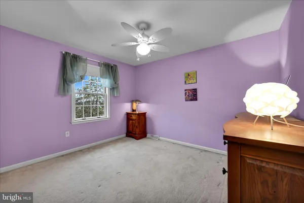 a view of a livingroom with a workspace