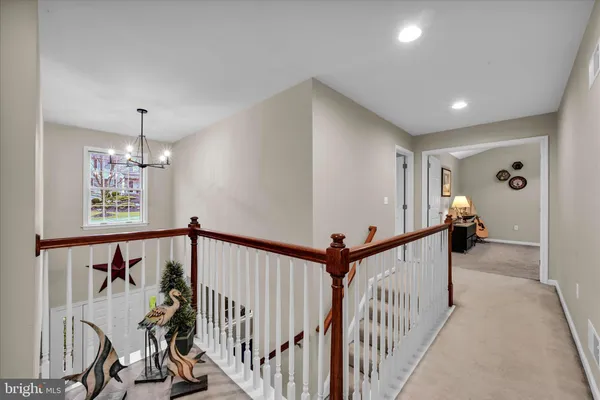 a view of a hallway with windows