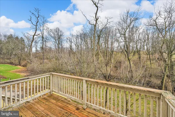 a view of a wooden roof deck