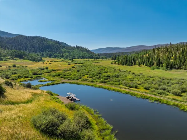 a view of a lake with a mountain in the background