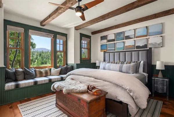 a living room with furniture and windows