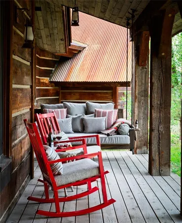a backyard of a house with barbeque oven table and chairs