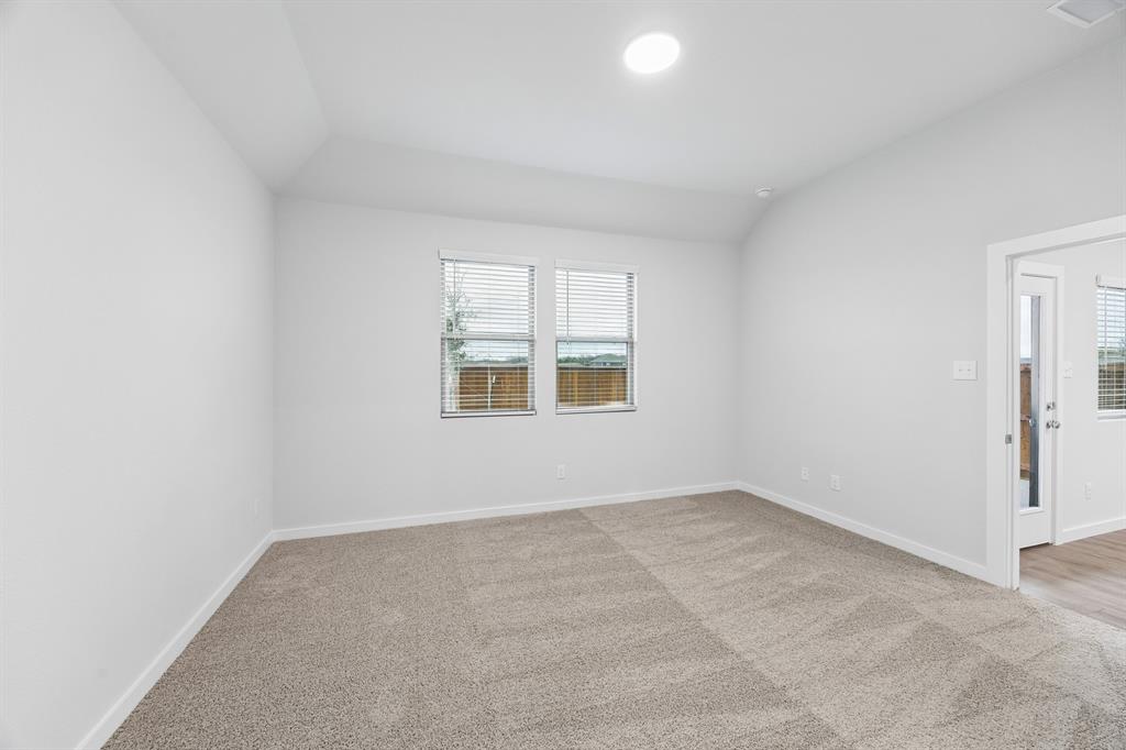 1322 Capecastle Lane Forney, TX 75126 - Photo 15 of 31 an empty room with windows