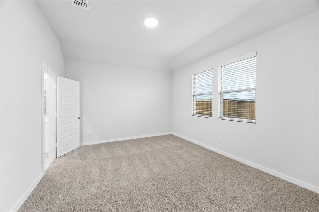 1322 Capecastle Lane Forney, TX 75126 - Photo 16 of 31 an empty room with a window
