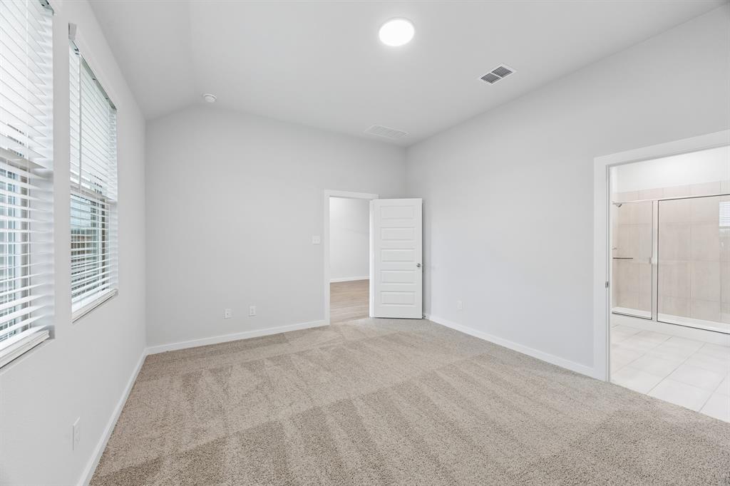 1322 Capecastle Lane Forney, TX 75126 - Photo 17 of 31 a view of an empty room with a window