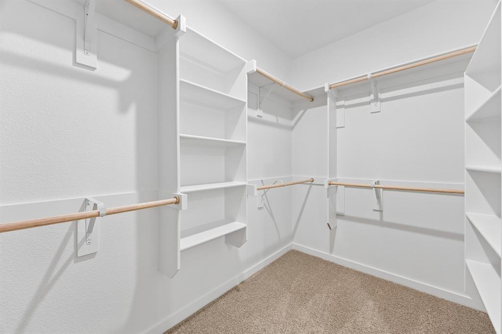 1322 Capecastle Lane Forney, TX 75126 - Photo 22 of 31 a view of an empty walk in closet